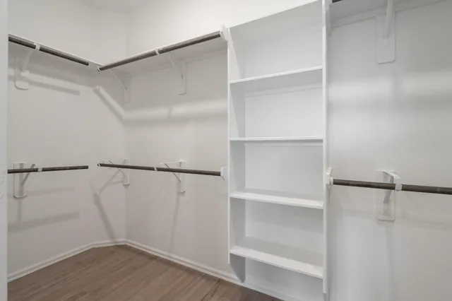a view of an empty walk in closet