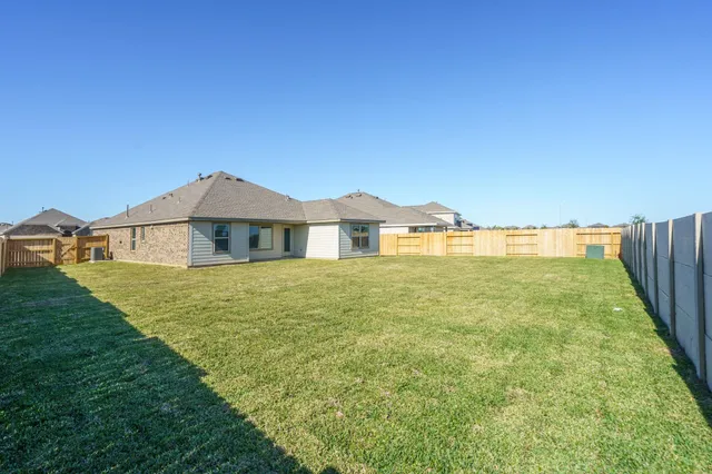 a bathroom with a small yard