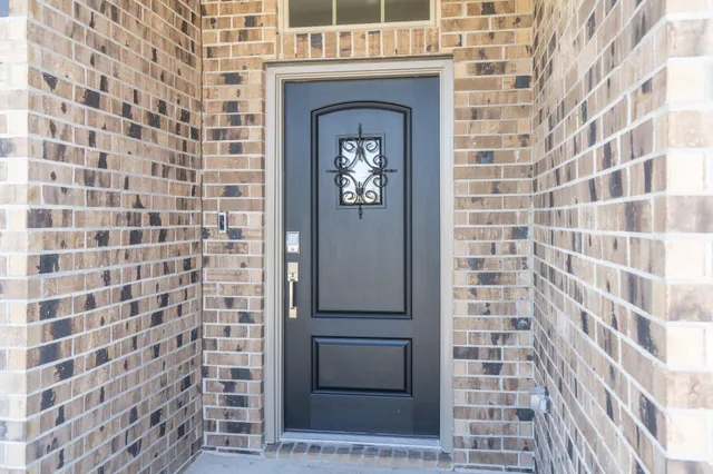 a front view of a house with a door