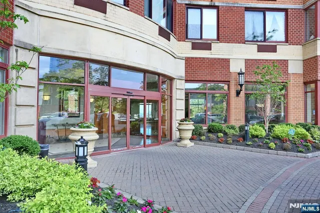 a view of a building with sitting area