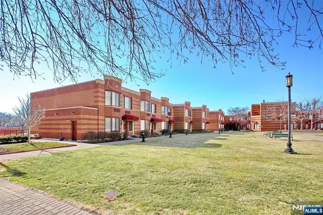 a view of a city with tall buildings