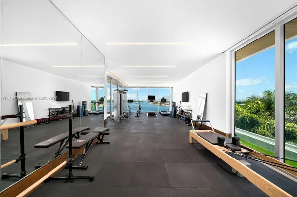 a view of a room with gym equipment
