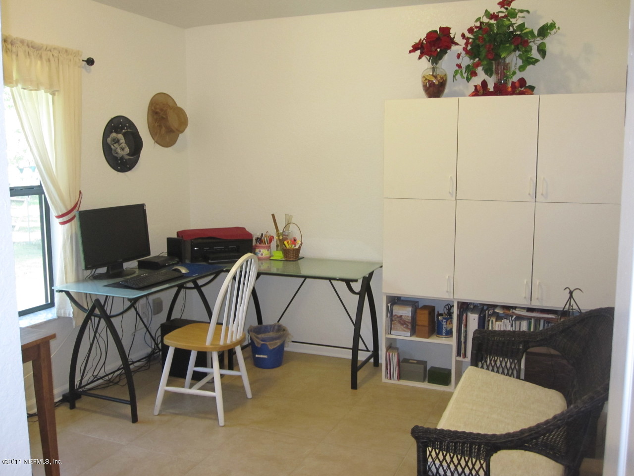 12589 Knotah Road Jacksonville, FL 32258 - Photo 12 of 25 a view of a dining room with furniture and a potted plant
