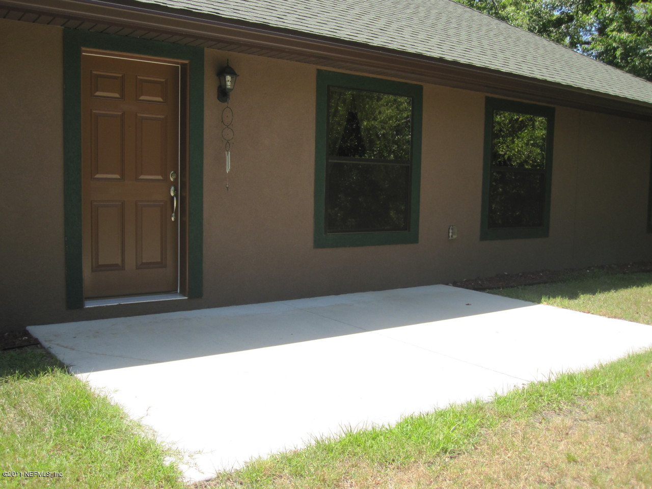 12589 Knotah Road Jacksonville, FL 32258 - Photo 17 of 25 a view of backyard with hardwood
