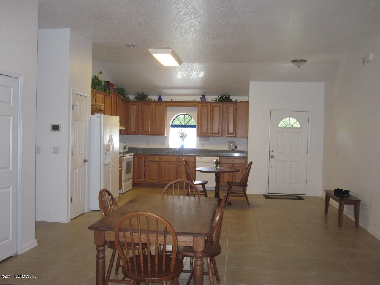 12589 Knotah Road Jacksonville, FL 32258 - Photo 3 of 25 a view of a dining room with furniture