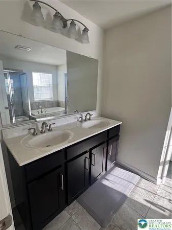 an empty room with a empty space and windows