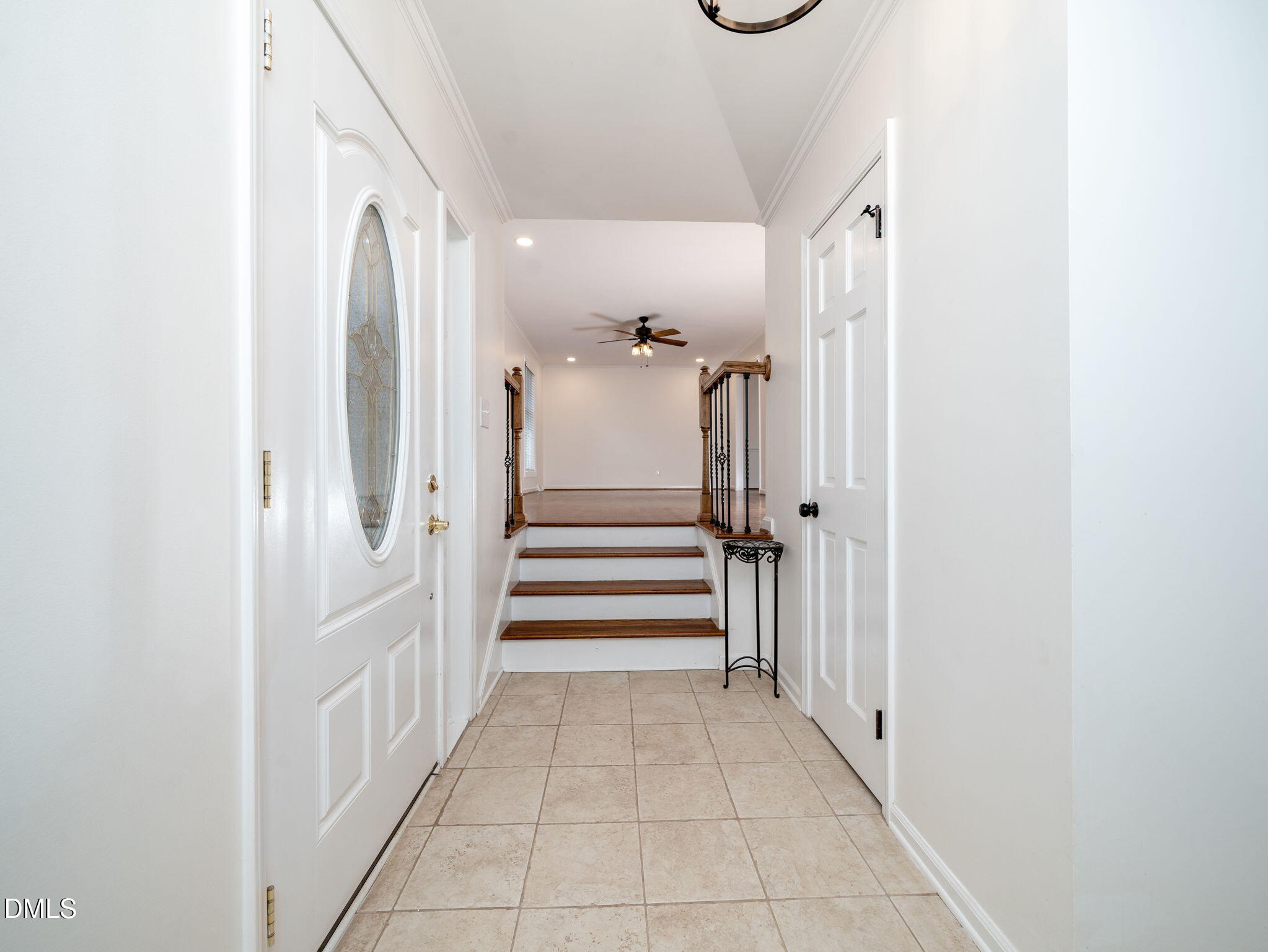 705 Villawood Court Raleigh, NC 27615 - Photo 5 of 31 The entry foyer features tile flooring and 2 closets for your convenience.