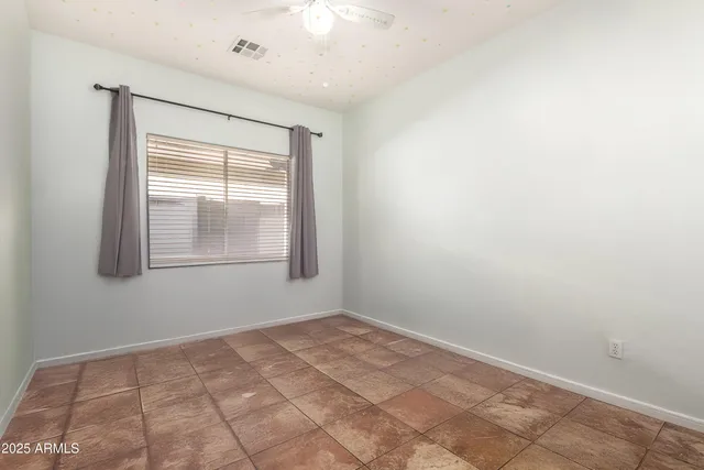 a view of an empty room with window