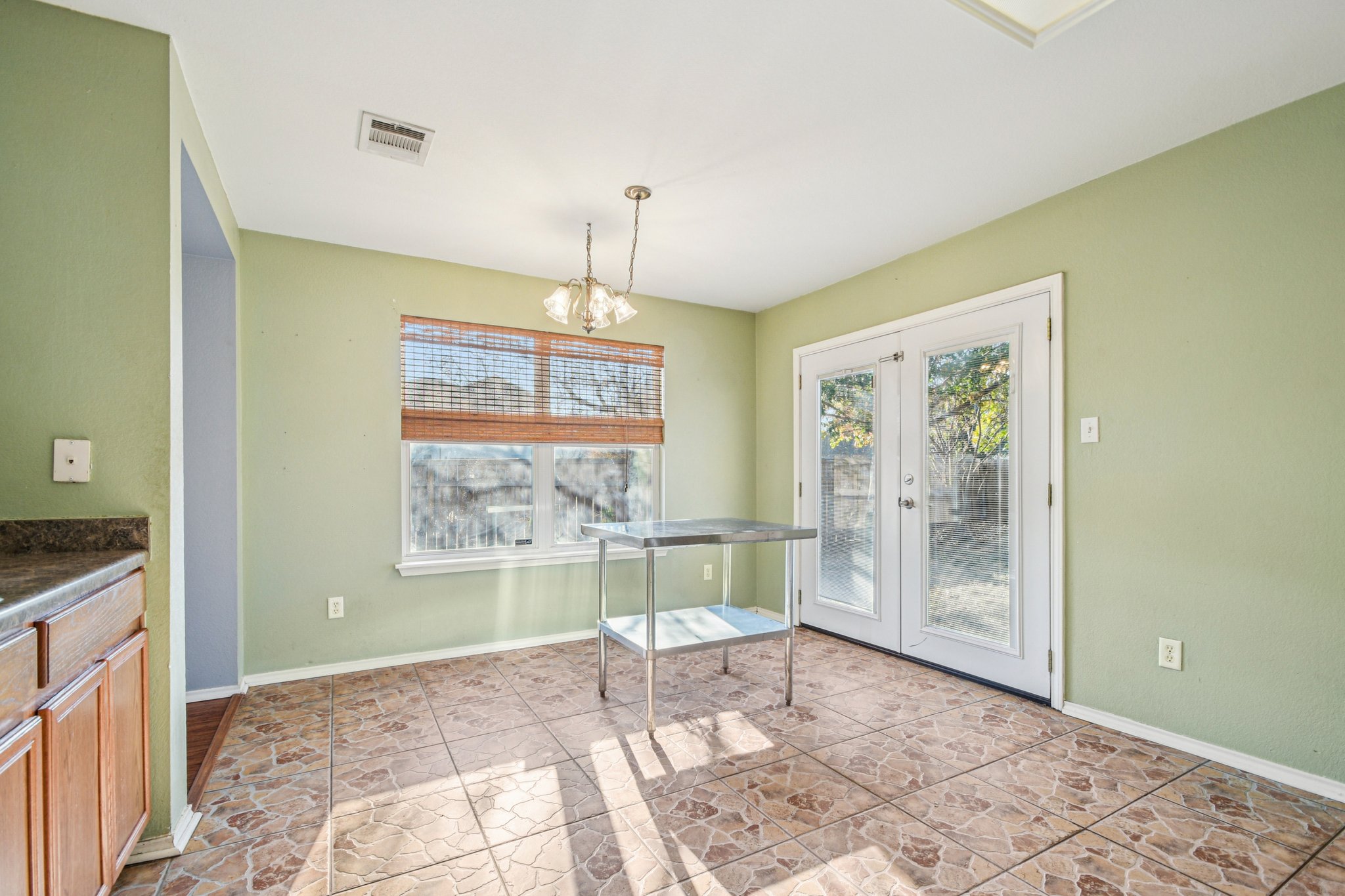 100 Kendall Cove Elgin, TX 78621 - Photo 13 of 31 a view of a livingroom with wooden floor and a window