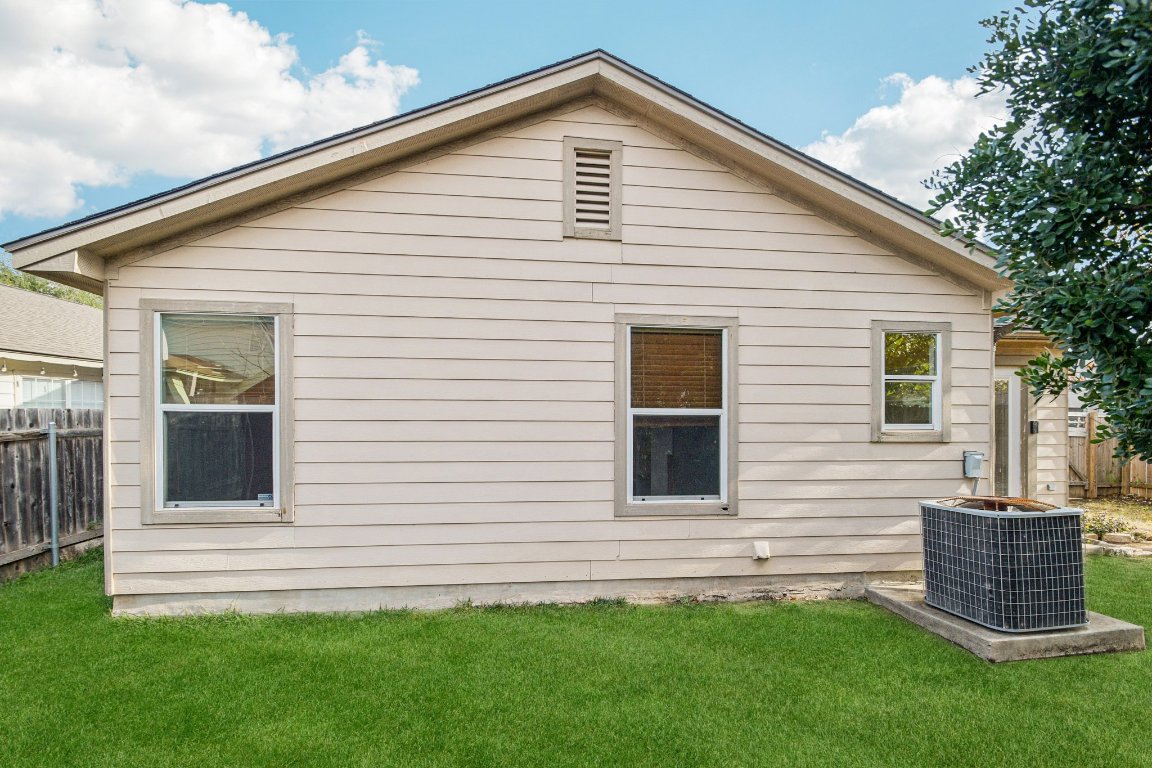 100 Kendall Cove Elgin, TX 78621 - Photo 28 of 31 a view of a house with a yard