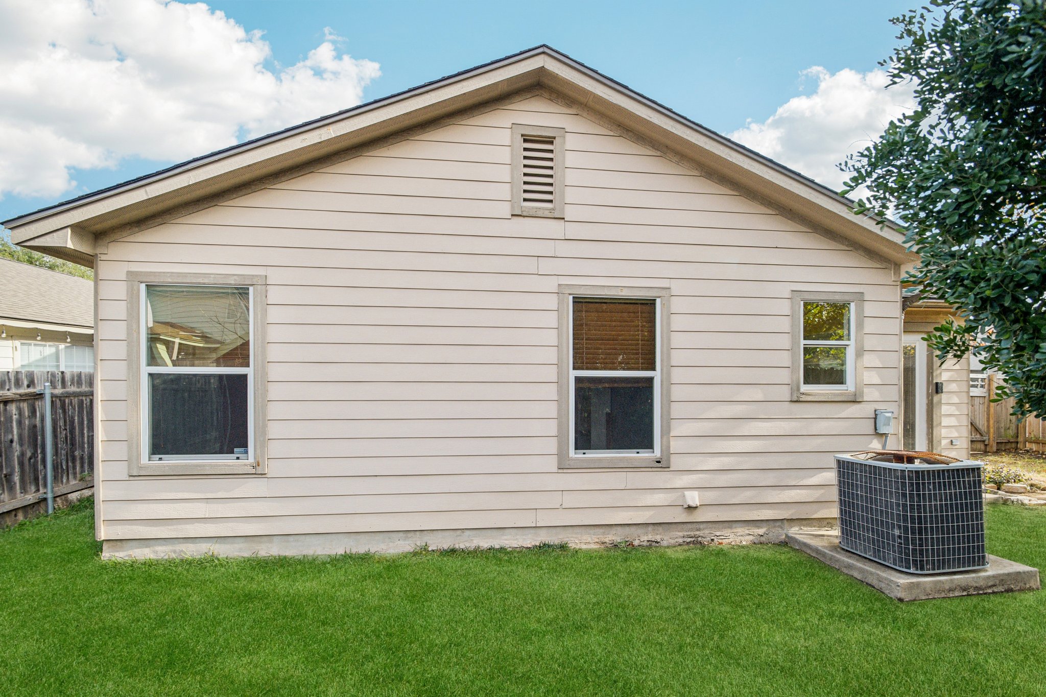 100 Kendall Cove Elgin, TX 78621 - Photo 28 of 31 a view of a house with a yard