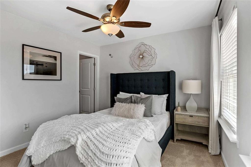 10 American Avenue, Unit ANISE Newnan, GA 30263 - Photo 24 of 47 a bedroom with a bed and a window