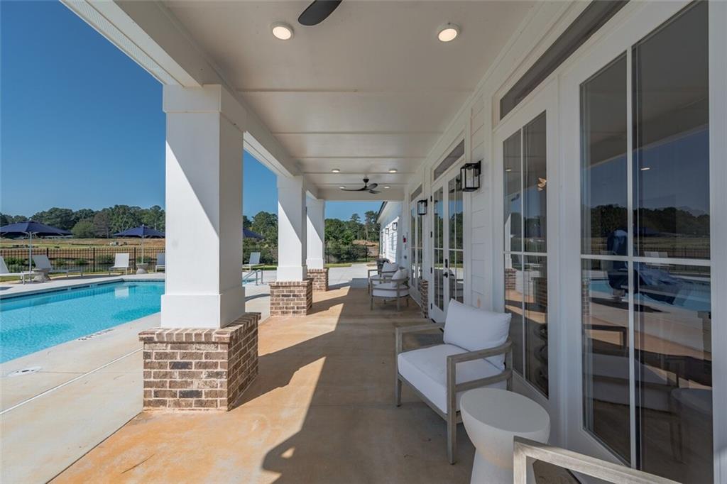 10 American Avenue, Unit ANISE Newnan, GA 30263 - Photo 37 of 47 a view of a living room and balcony