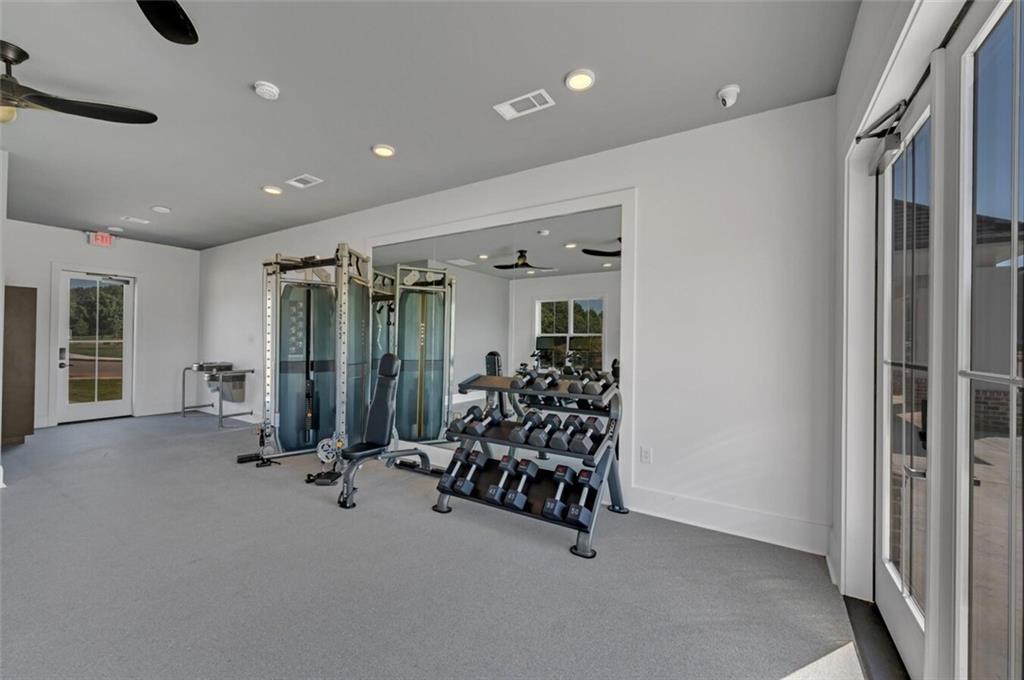 10 American Avenue, Unit ANISE Newnan, GA 30263 - Photo 41 of 47 a view of a room with gym equipment