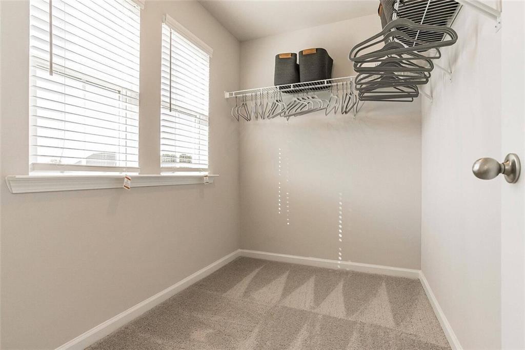 10 American Avenue, Unit ANISE Newnan, GA 30263 - Photo 10 of 47 a view of an empty room with a window
