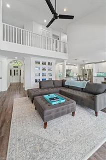 a living room with furniture and a table