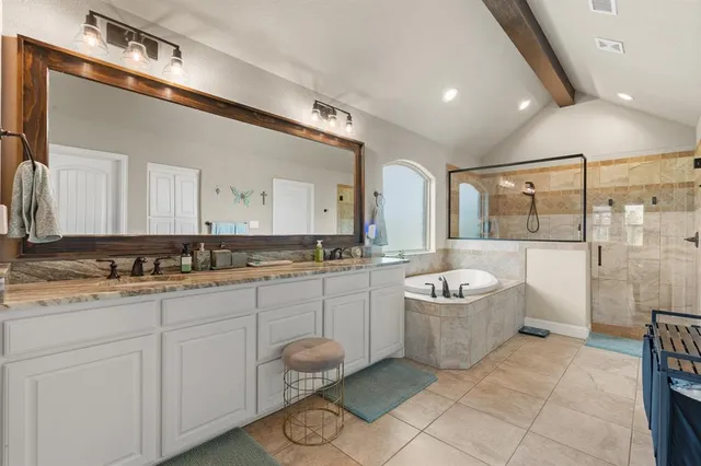 a bedroom with a bed and a walk in closet