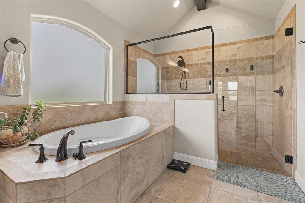 9708 Puma Trail Godley, TX 76044 - Photo 16 of 40 a bathroom with a sink and shower