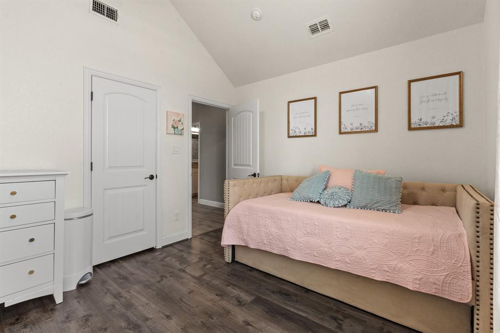 9708 Puma Trail Godley, TX 76044 - Photo 25 of 40 a bedroom with a bed and a closet