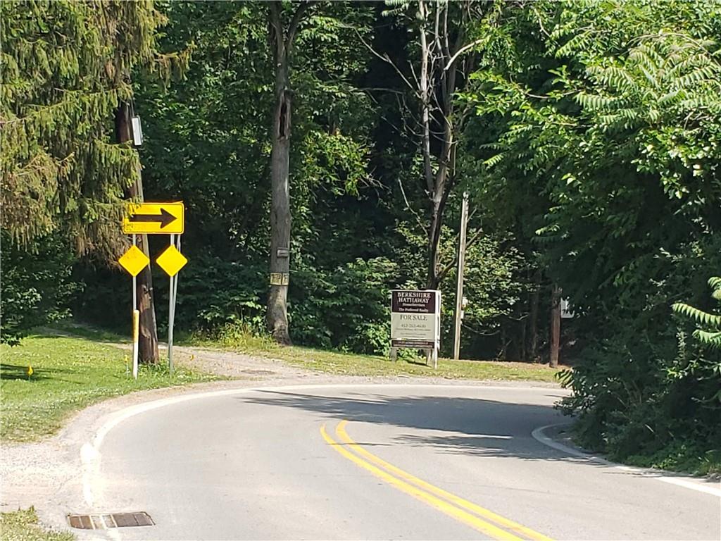 1439 Sharon Road New Brighton, PA 15066 - Photo 2 of 33 a view of street with tall trees