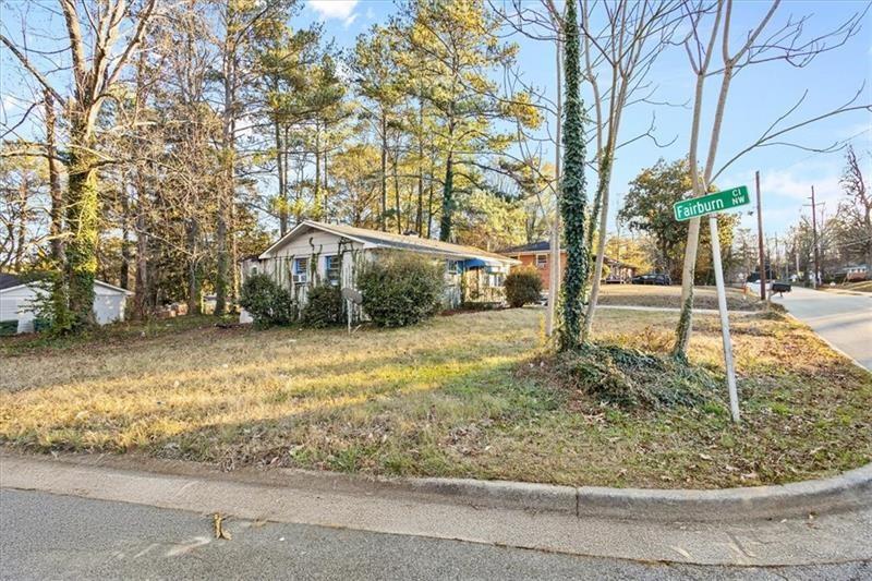 685 Bolton Road Northwest Atlanta, GA 30331 - Photo 19 of 21 a view of a yard with an outdoor space