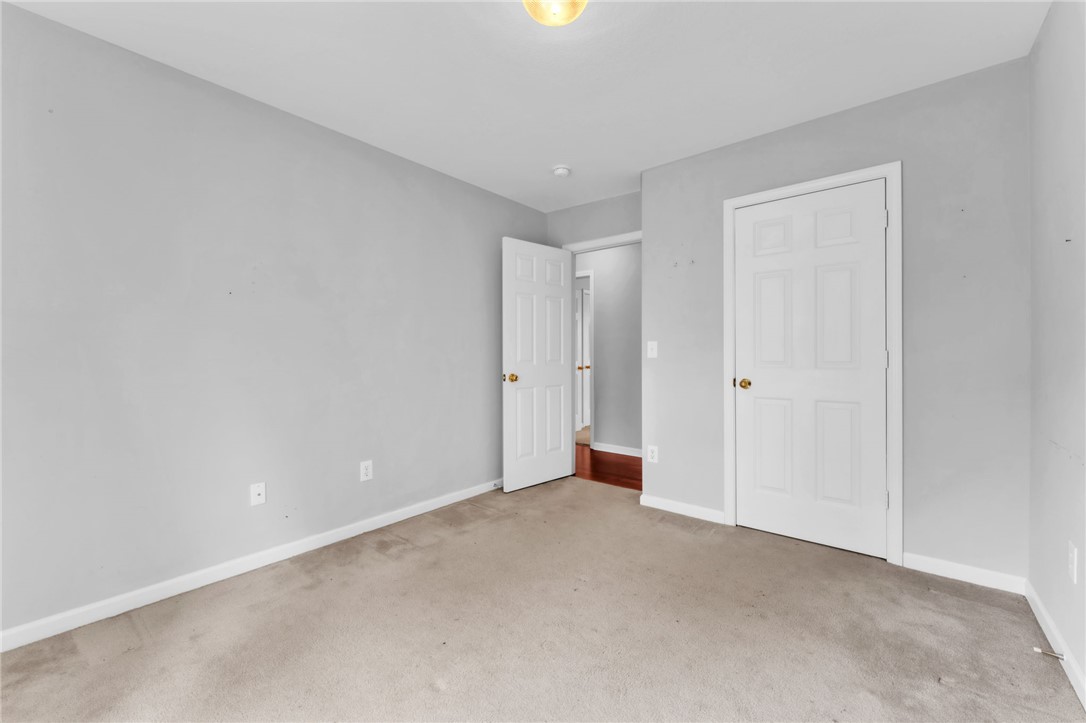 1816 Marchbanks Avenue Anderson, SC 29621 - Photo 17 of 31 This spacious room offers comfort and potential, featuring soft carpeting and a clear, open layout.