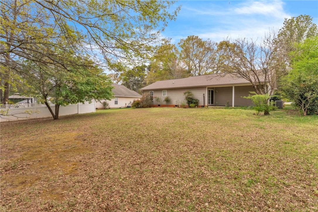 1816 Marchbanks Avenue Anderson, SC 29621 - Photo 23 of 31 A spacious backyard with mature trees offers ample room for outdoor activities.