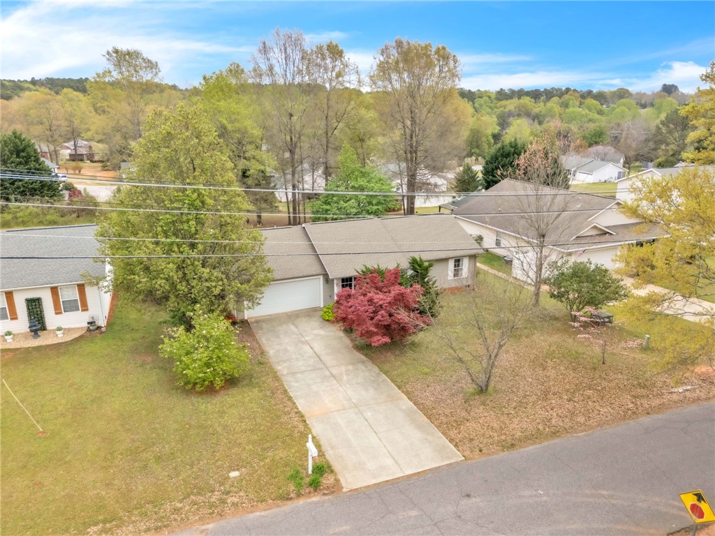 1816 Marchbanks Avenue Anderson, SC 29621 - Photo 26 of 31 A well-maintained suburban residence featuring an attached garage and a concrete driveway.