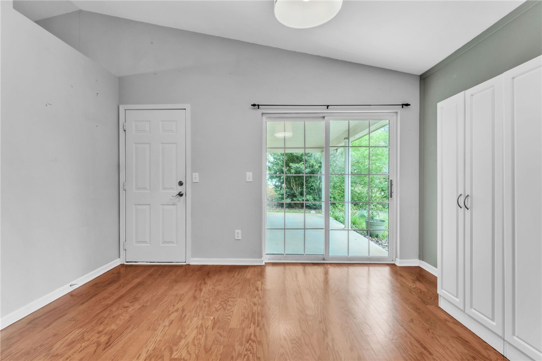 1816 Marchbanks Avenue Anderson, SC 29621 - Photo 10 of 31 This airy room features warm flooring and direct access to an outdoor area through sliding glass doors.