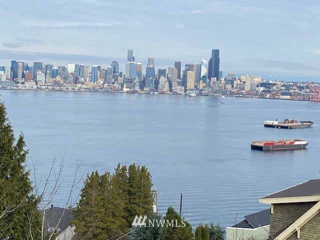 a view of a city with tall buildings