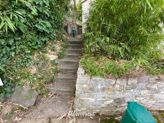 1701 41st Avenue Southwest Seattle, WA 98116 - Photo 21 of 21 a view of a pathway of a yard