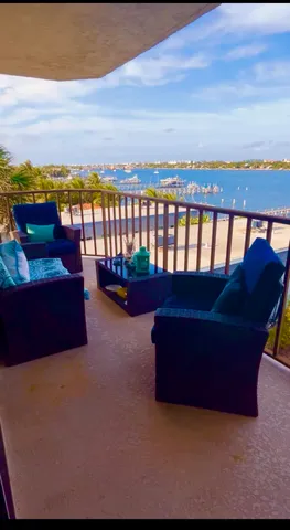 a bedroom with a bed chair and window