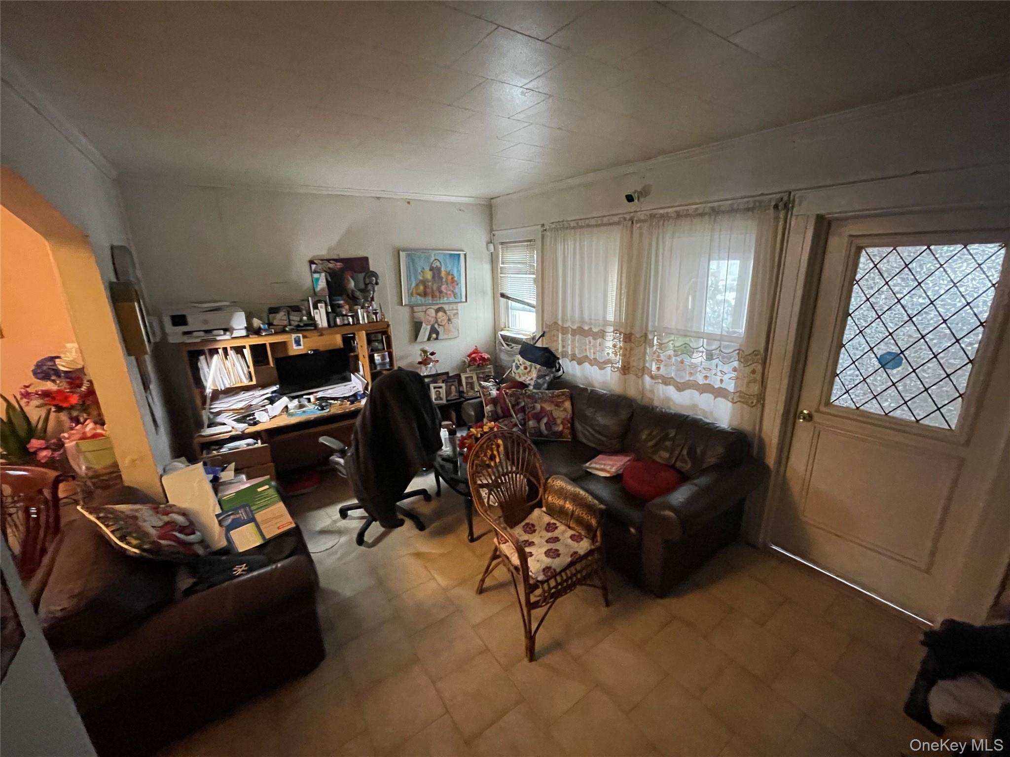 106-20 109th Avenue Queens, NY 11417 - Photo 4 of 12 Home office with tile patterned floors