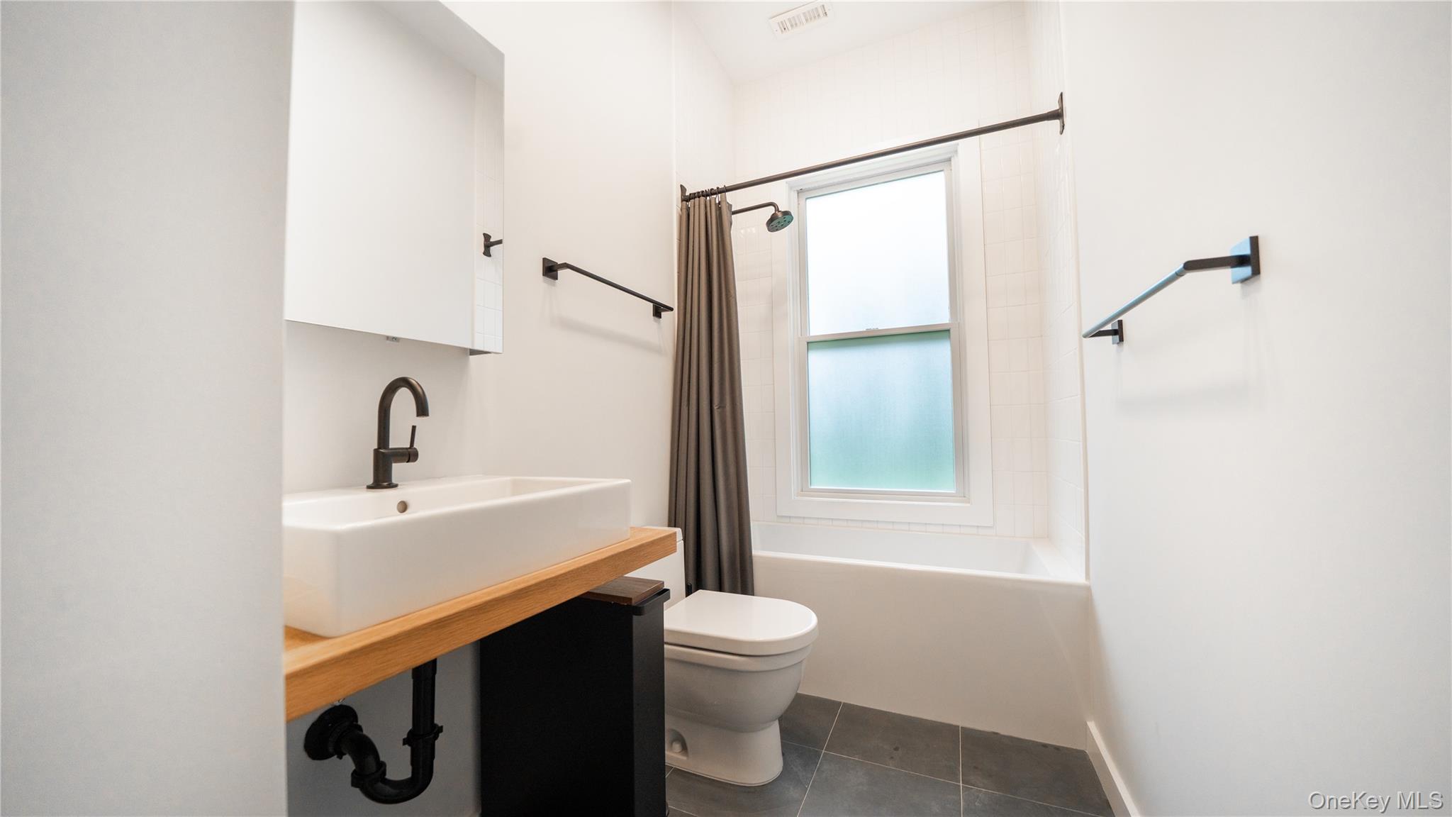102 Rider Hollow Road Arkville, NY 12406 - Photo 11 of 17 a bathroom with a sink toilet and shower