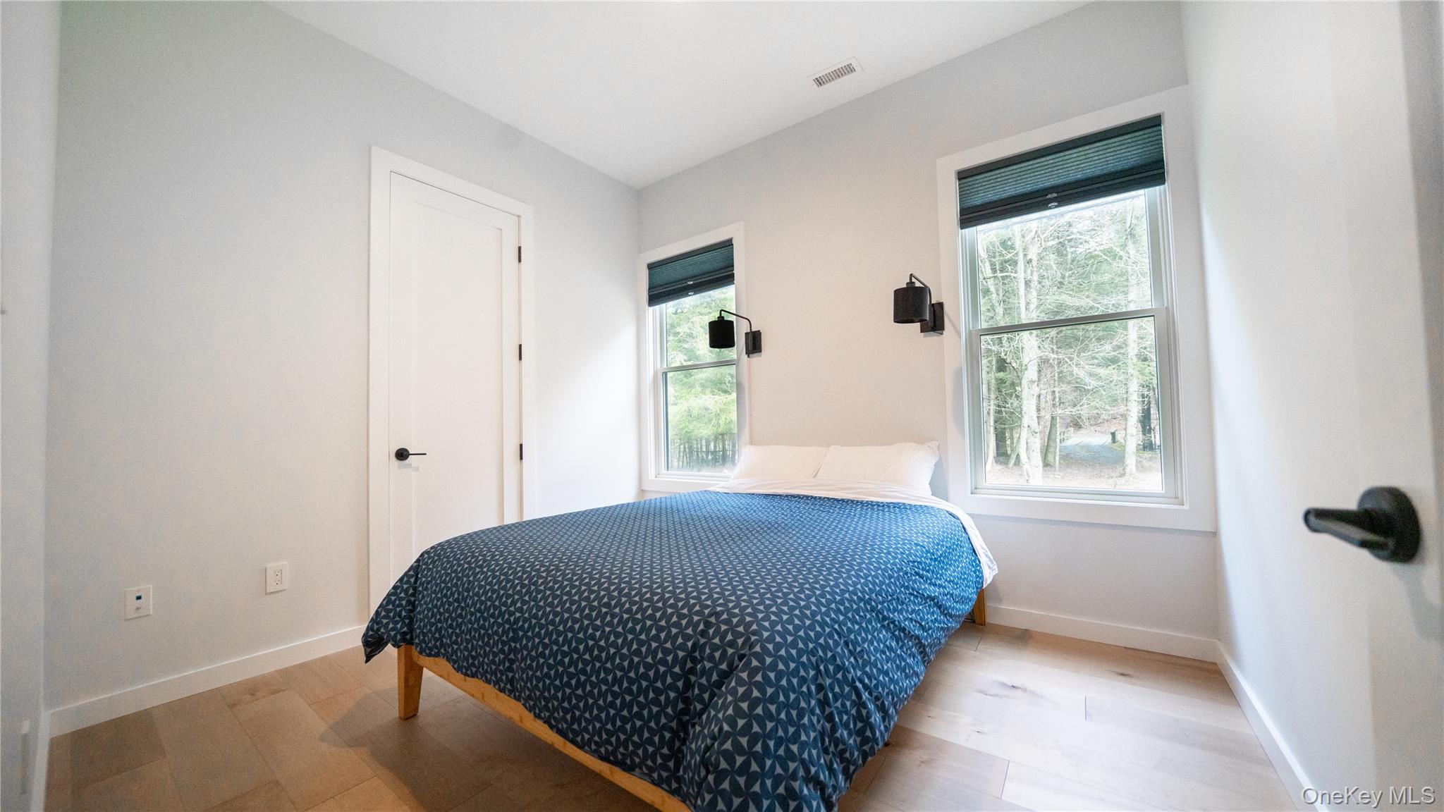 102 Rider Hollow Road Arkville, NY 12406 - Photo 2 of 17 a bedroom with a bed and a window