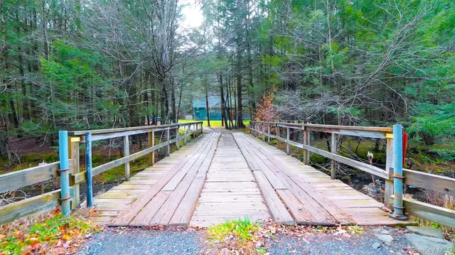 a dining room with furniture and a bathtub