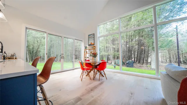 a view of balcony with wooden floor and fence