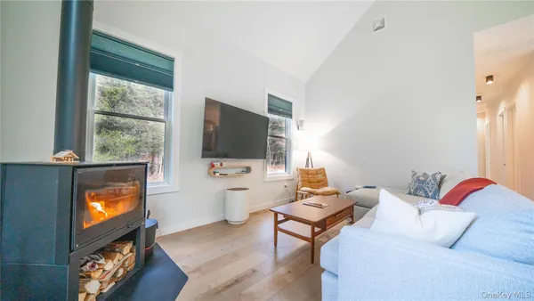 a dining room with furniture and a bathtub