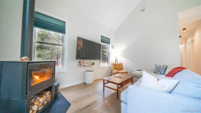 a dining room with furniture and a bathtub