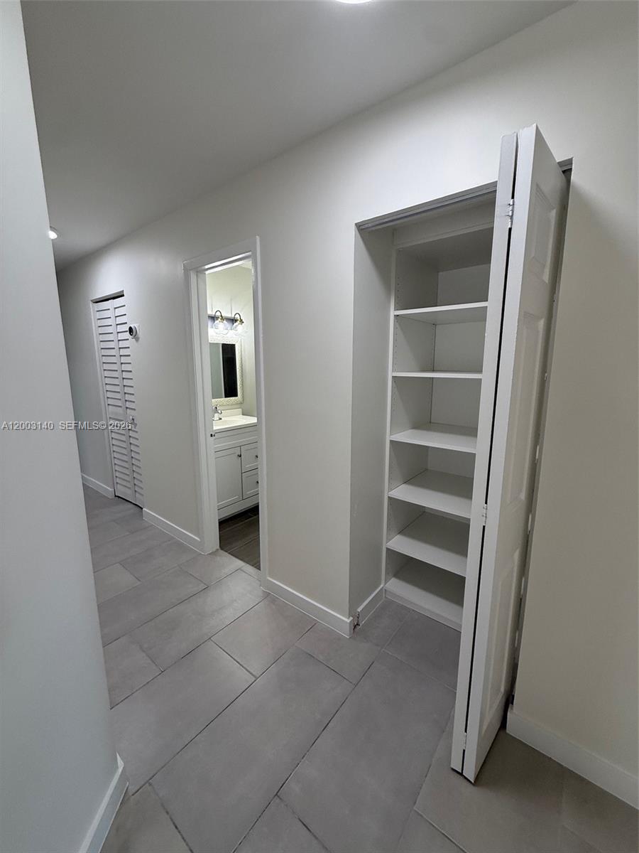 531 Southwest 89th Court, Unit 1 Miami, FL 33174 - Photo 14 of 35 Hallway to bedrooms