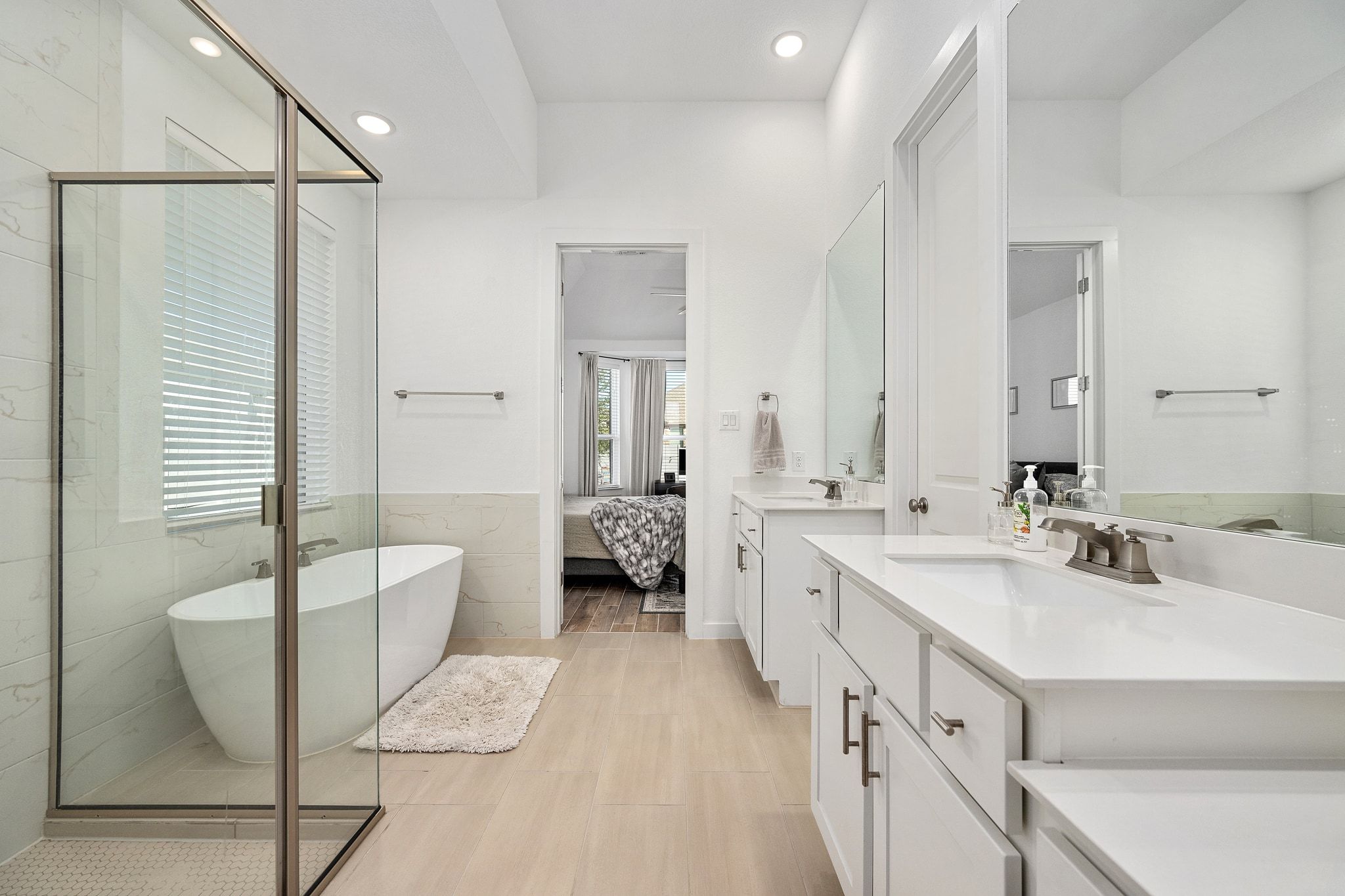 1201 Highcrest Georgetown, TX 78628 - Photo 24 of 40 a spacious bathroom with a double vanity sink a mirror and a shower