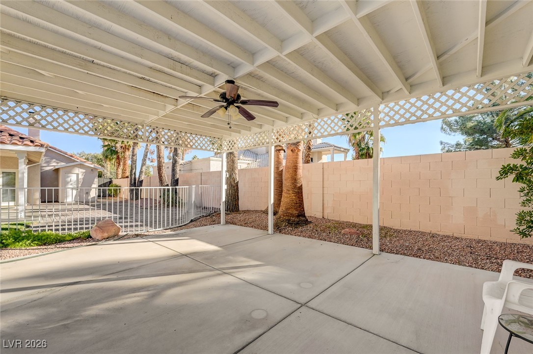 2955 El Camino Road Las Vegas, NV 89146 - Photo 86 of 99 Fenced backyard with a ceiling fan and a patio area