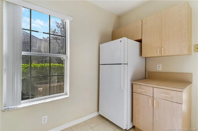 a view of a balcony with wooden floor