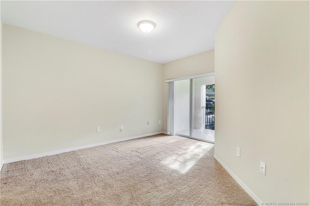110 Southwest Peacock Boulevard, Unit 6104 Port St. Lucie, FL 34986 - Photo 15 of 27 a view of an empty room