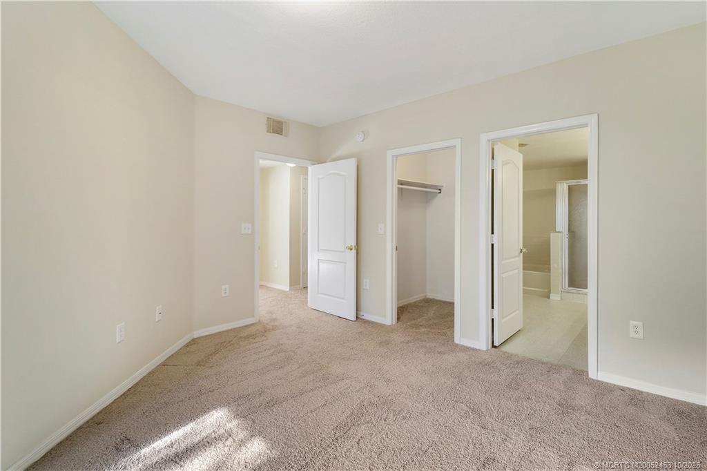 110 Southwest Peacock Boulevard, Unit 6104 Port St. Lucie, FL 34986 - Photo 17 of 27 a view of an empty room