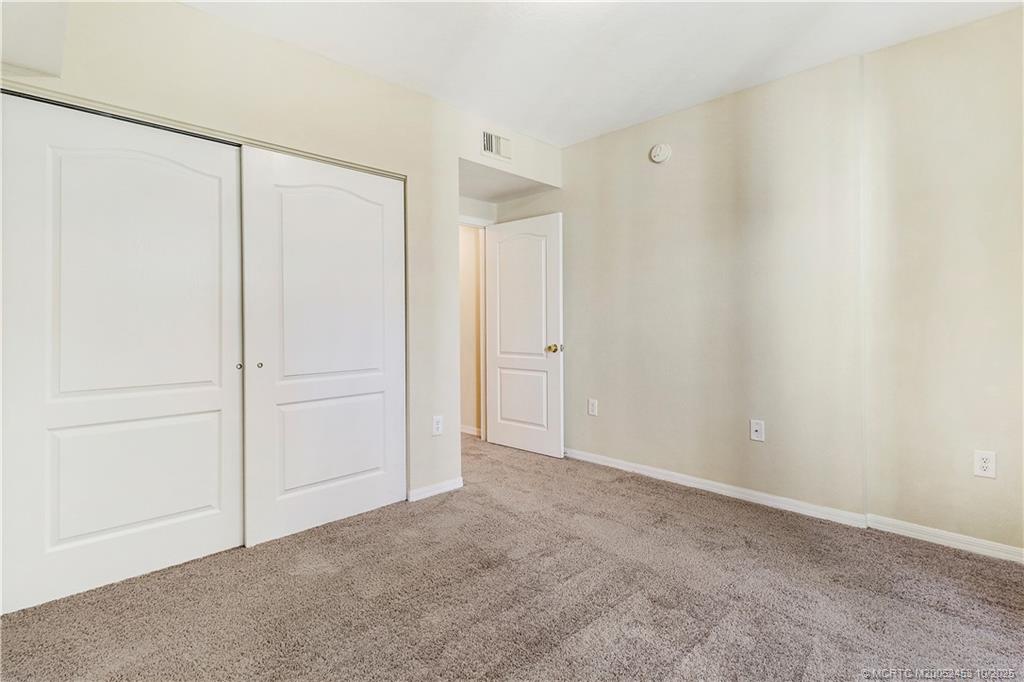 110 Southwest Peacock Boulevard, Unit 6104 Port St. Lucie, FL 34986 - Photo 20 of 27 a view of an empty room