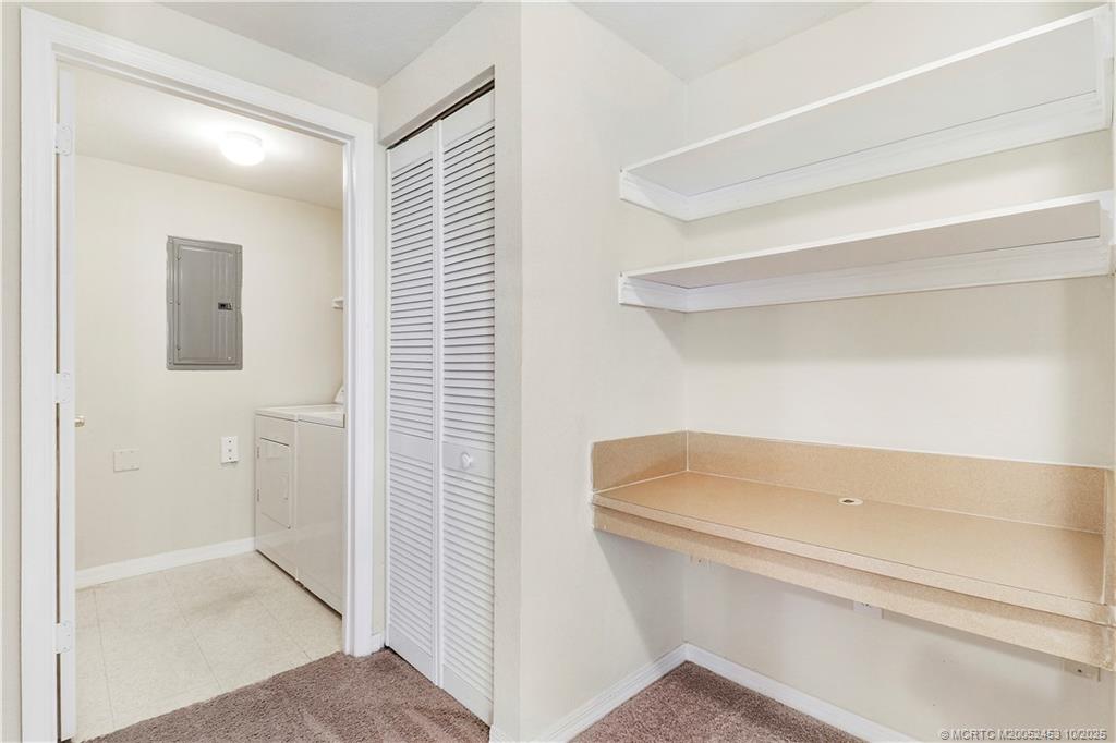 110 Southwest Peacock Boulevard, Unit 6104 Port St. Lucie, FL 34986 - Photo 22 of 27 a bathroom with a bathtub