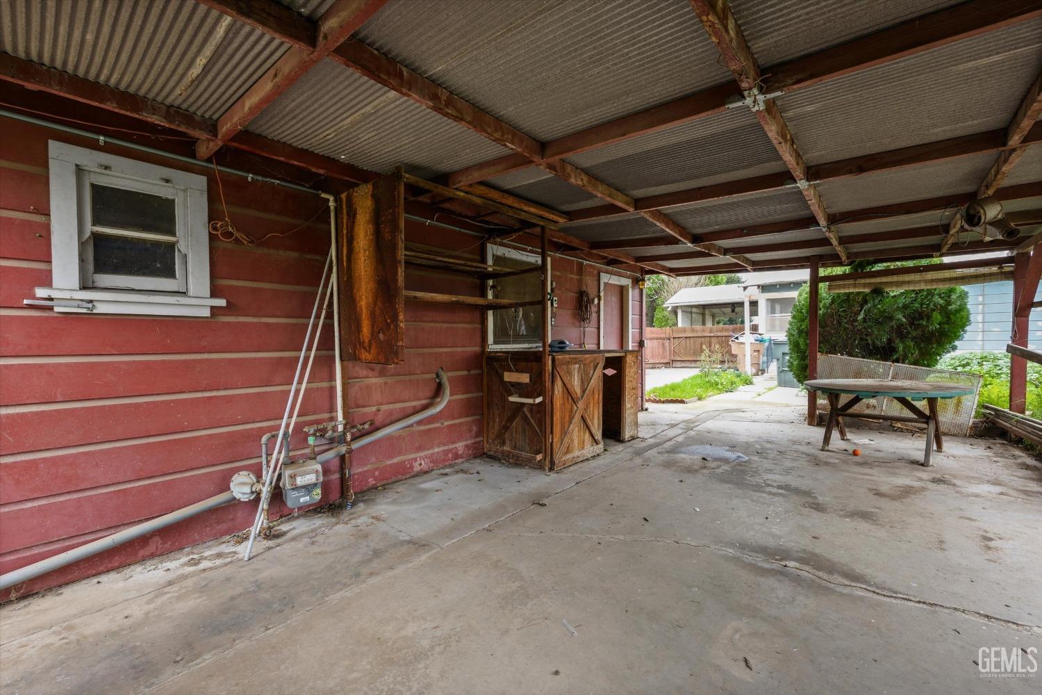 Undisclosed Address Bakersfield, CA 93308 - Photo 27 of 50 a view of a room with wooden walls