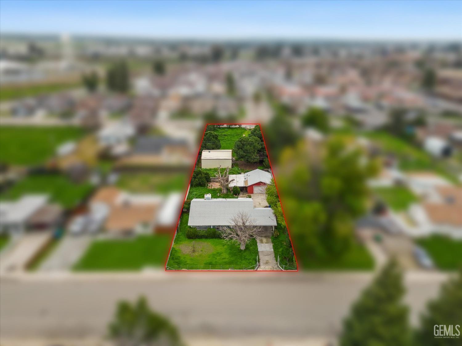 Undisclosed Address Bakersfield, CA 93308 - Photo 30 of 50 a picture of a yard