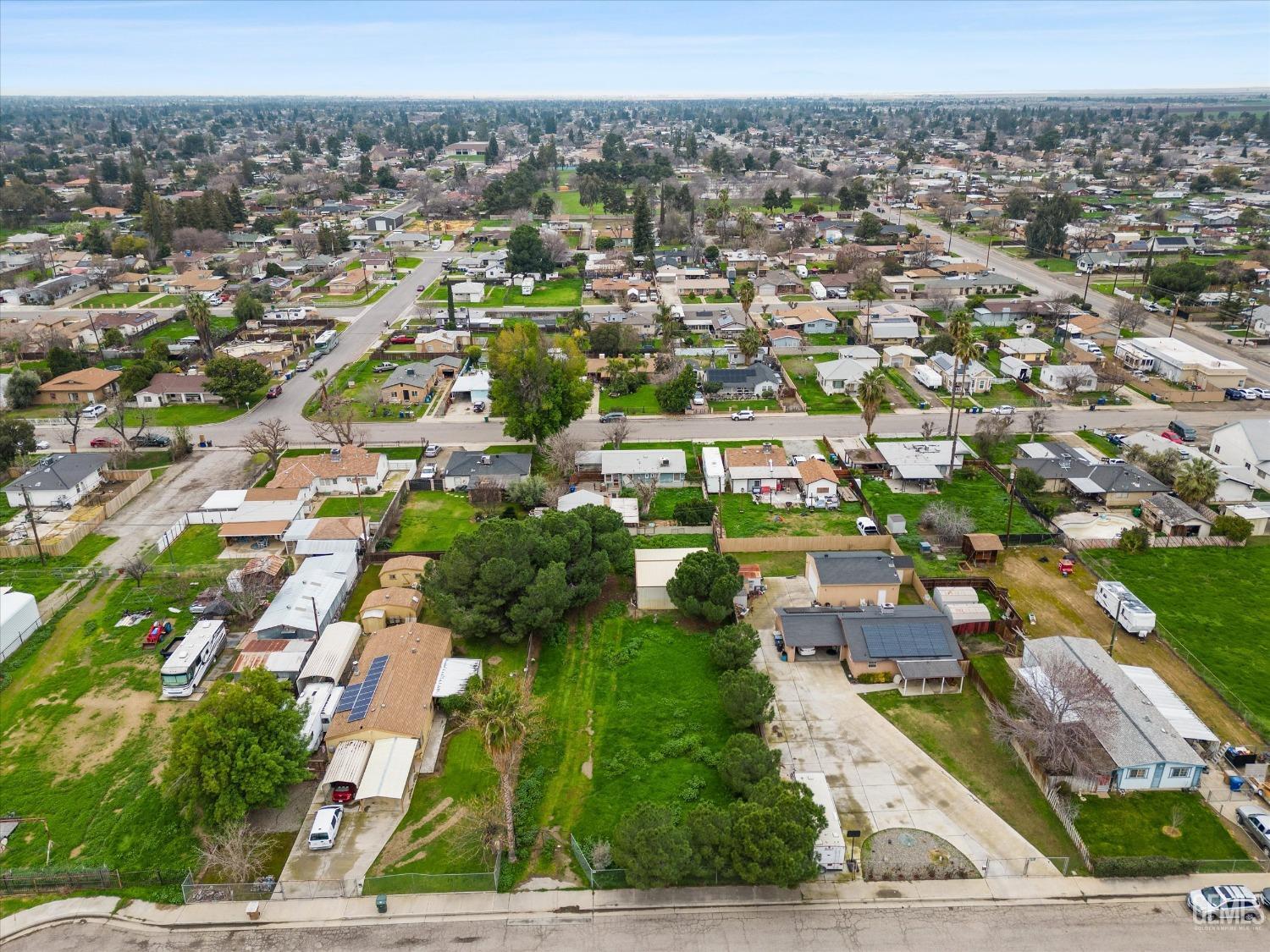Undisclosed Address Bakersfield, CA 93308 - Photo 32 of 50 an aerial view of residential houses with outdoor space